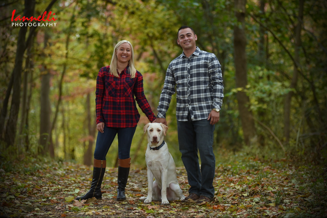 Couple Standing with Dog